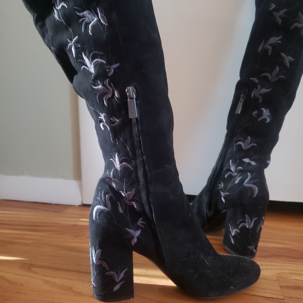 Over the knee black boots with design on back